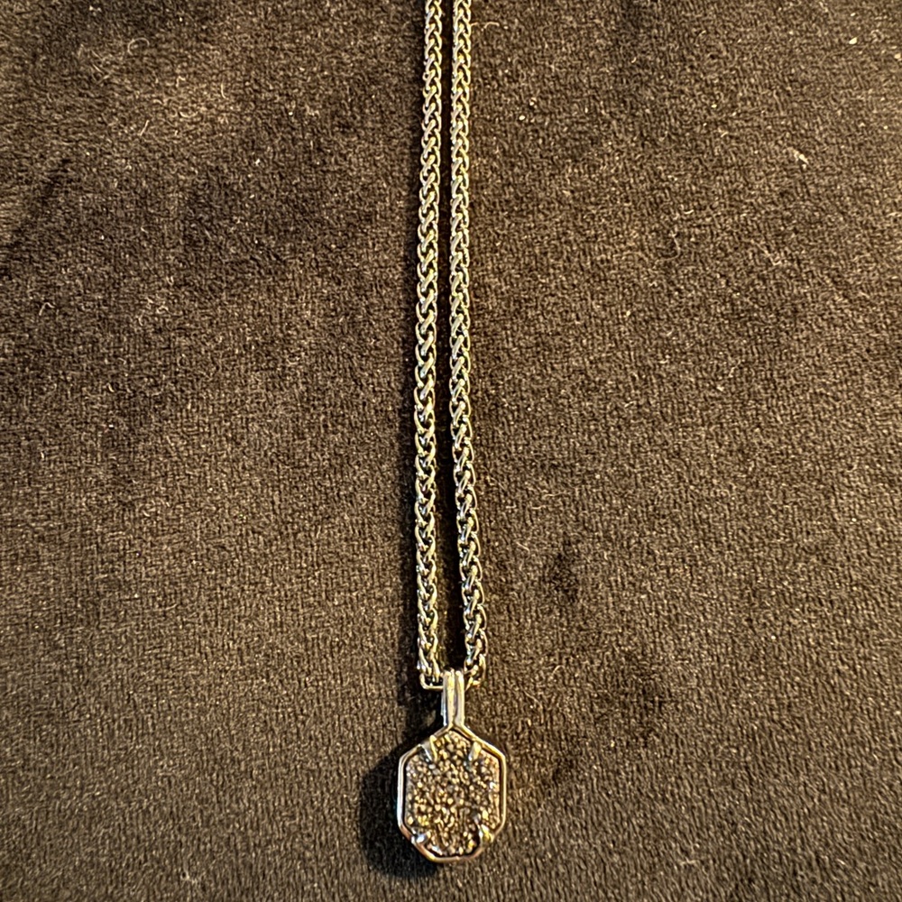 Sparkly black pendant with long gunmetal chain